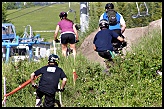 Running downhill
through the bushes. 
Taken 2008 at COP.  (252 kb).
This is on the west side
 of Calgary, Canada 
where the 1988 Winter 
Olympics were held. 